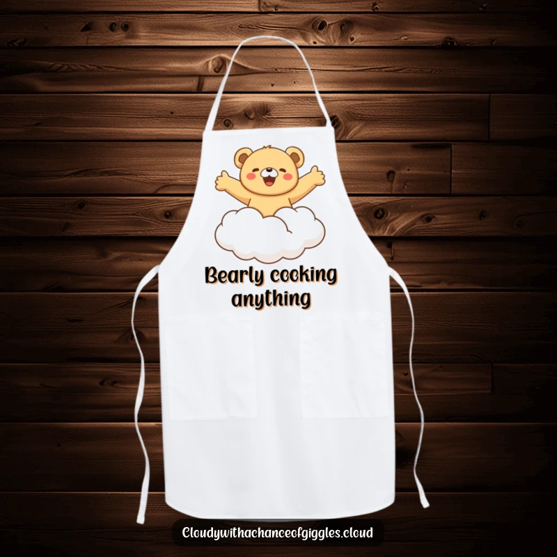 Funny bear cub joyfully riding a fluffy cloud with arms outstretched, depicted on a practical apron for whimsical kitchen activities.