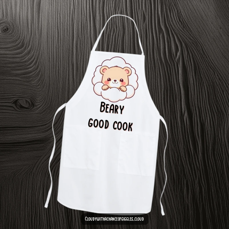 Funny apron showcasing a cute bear cub peeking from behind a large, smiling cloud, perfect for kitchen play.