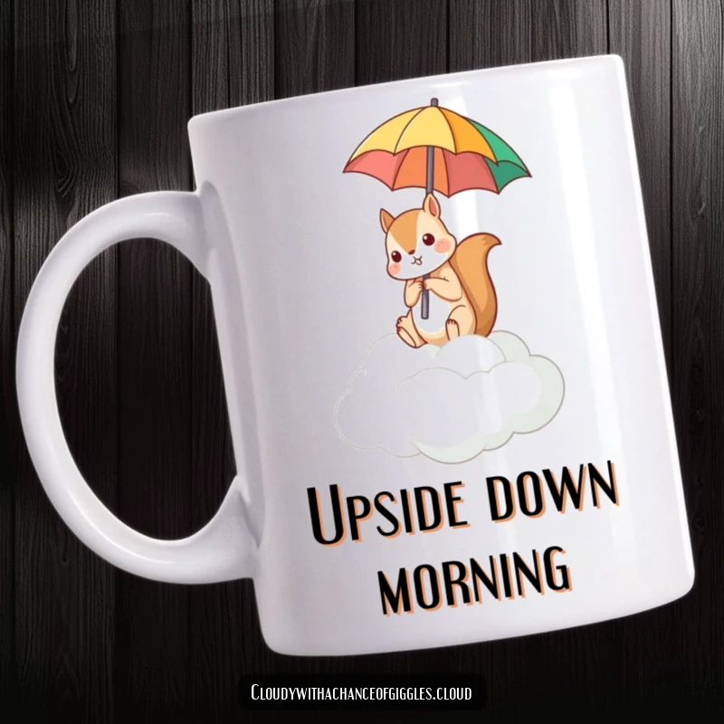 Funny mug showing a small squirrel sitting on a cloud, holding an umbrella the wrong way up.