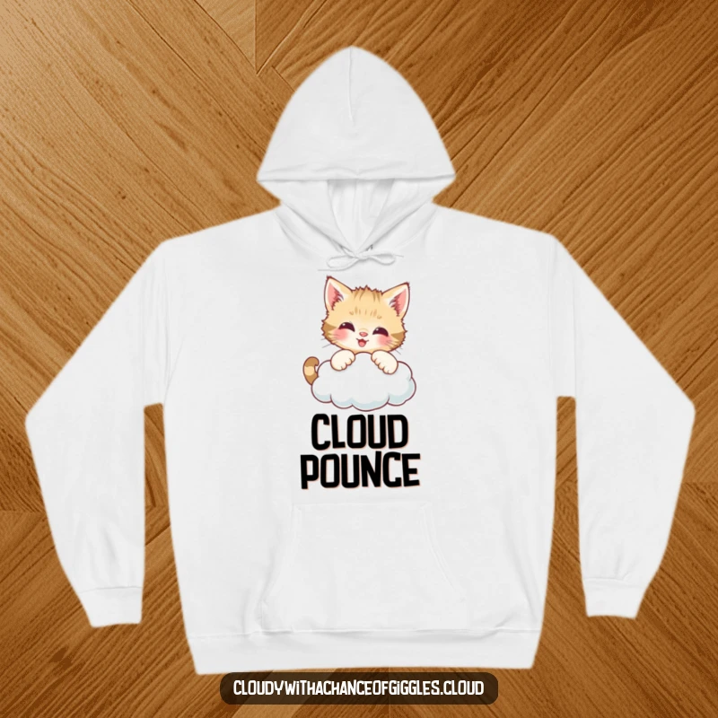 Funny hoodie featuring a curious kitten batting at a smiling cloud, designed for ultimate comfort and playful charm.