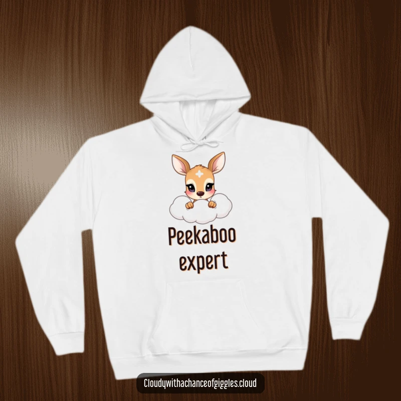 Funny hoodie with a shy deer with large eyes peeking from behind a fluffy cloud, soft and comforting design.