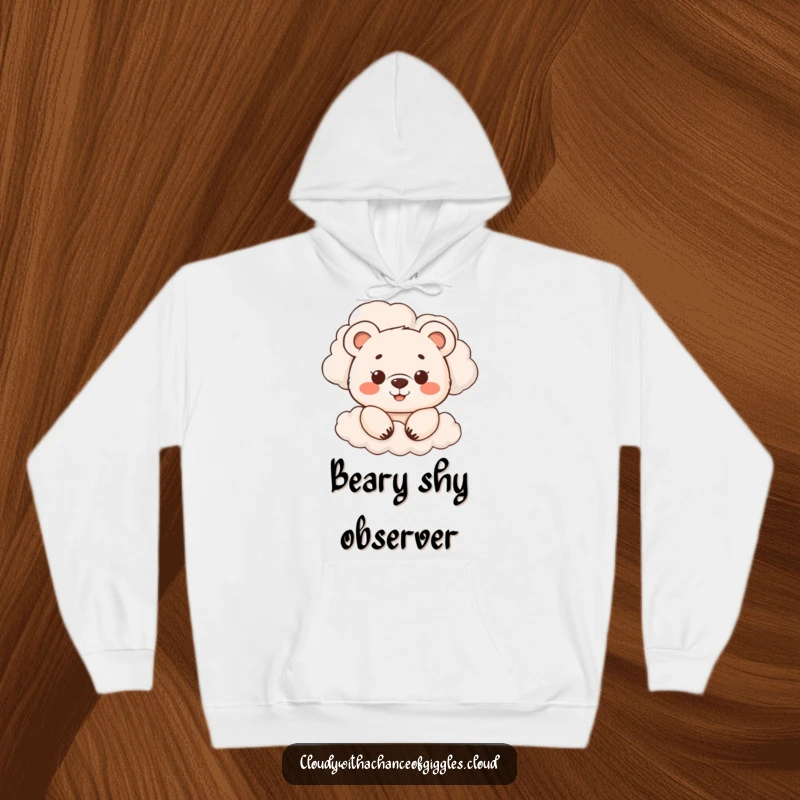 Funny hoodie with a smiling bear cub peeking from behind clouds, offering cozy comfort and a hint of playful mischief, a great funny gift.