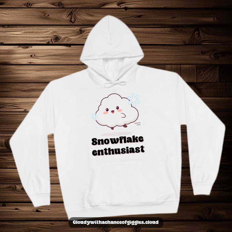 Funny hoodie featuring a playful cloud animal character delightedly chasing a dancing snowflake, embodying winter fun.