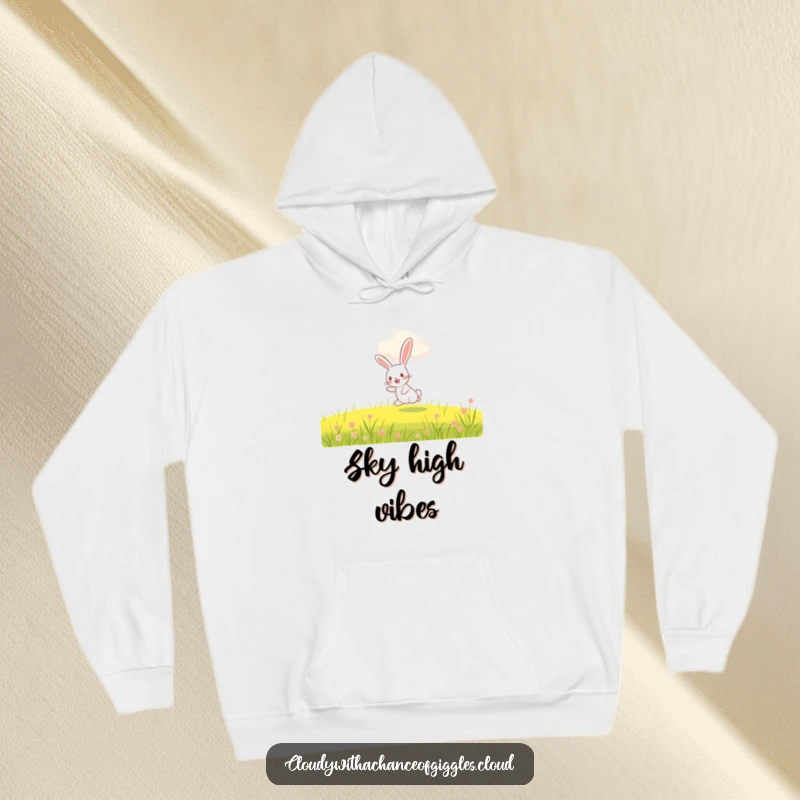 Funny rabbit hoodie, a happy rabbit hopping under a friendly smiling cloud, soft and cheerful outerwear.