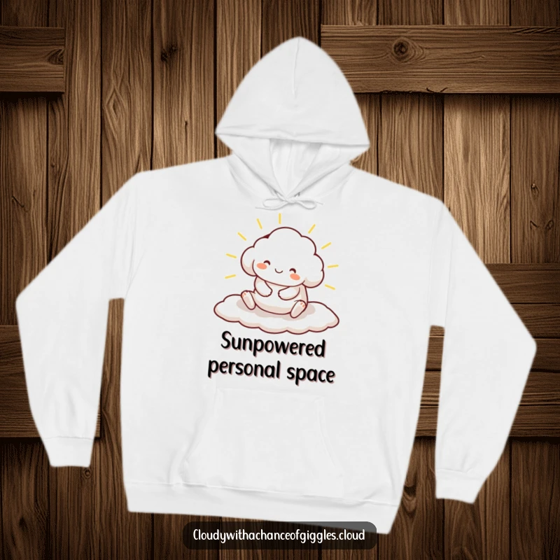 Funny hoodie featuring a contented cloud animal character stretching out on a sunbeam, embodying ultimate comfort and relaxation.