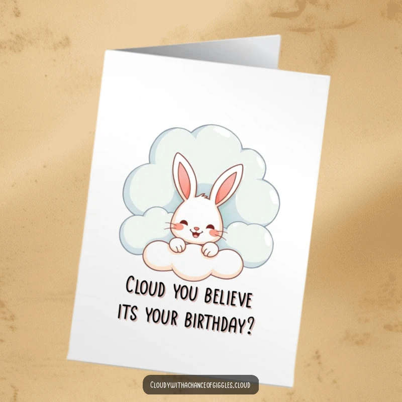 Funny Free Printable Birthday Card: Adorable bunny peeking from a whimsical cloud, spreading birthday cheer with a playful grin.