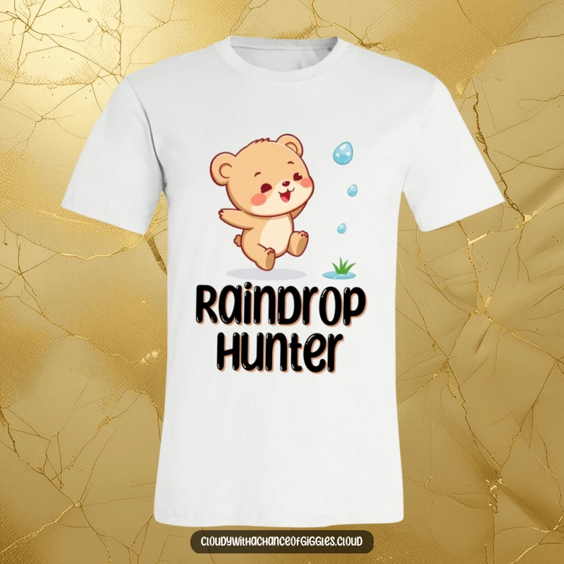 Funny Bear Cub T-Shirt: A small bear cub in a joyful leap, enthusiastically pursuing a falling raindrop.