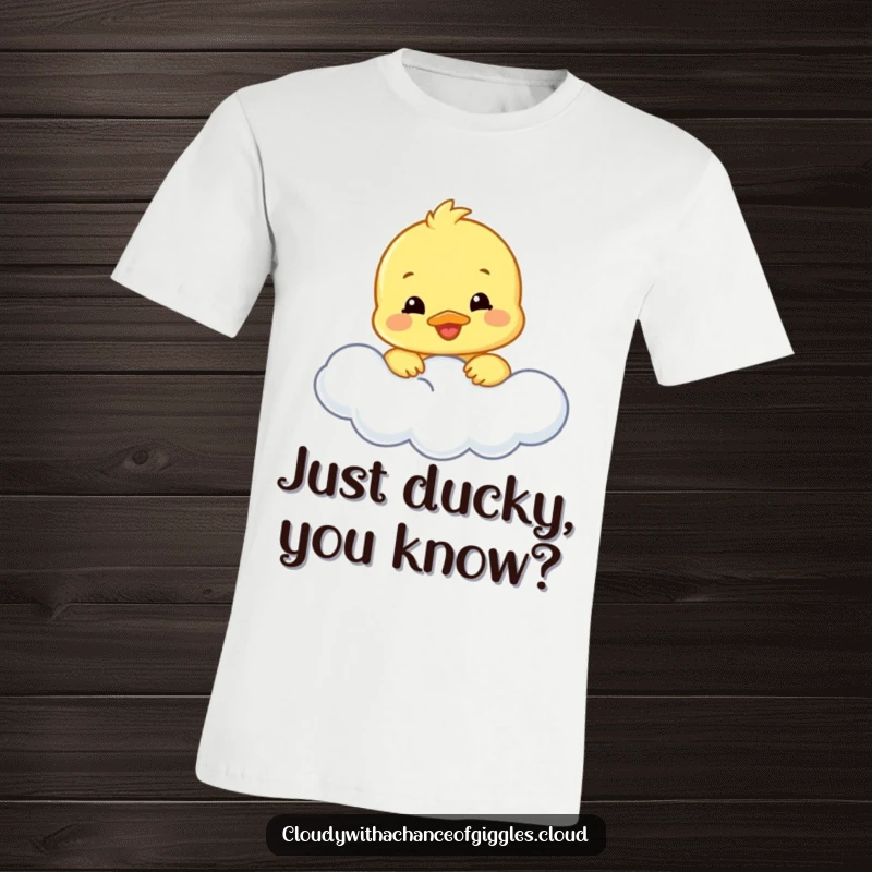 Funny duckling t-shirt showing a smiling duckling peeking out from behind a soft cloud, radiating pure joy and cuteness.