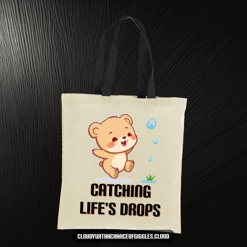 Funny Bear Cub Tote Bag: A small bear cub depicted in a joyful leap, reaching for a raindrop.