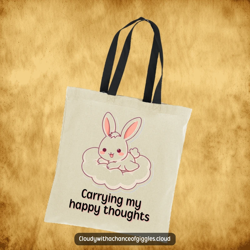 Funny bunny tote bag depicting a playful bunny with a cheerful expression sliding down a cloud, perfect for stylish and humorous carrying.